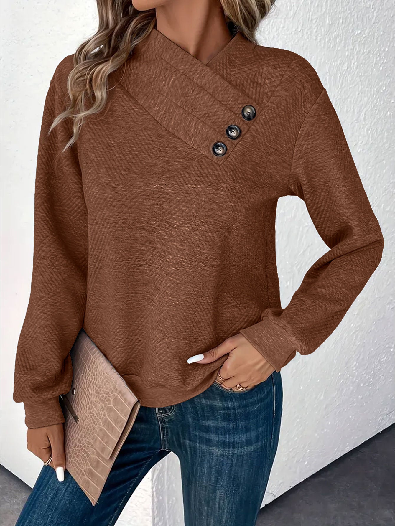 Sweatshirt pull avec un design boutonné et manches longues