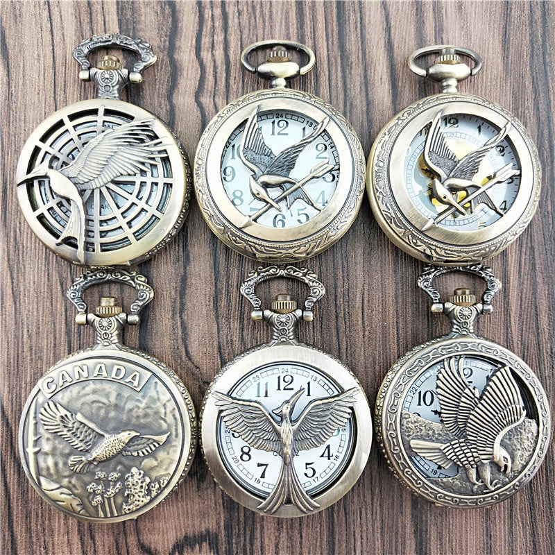 Vieille montre de poche fléchée aux gros oiseaux