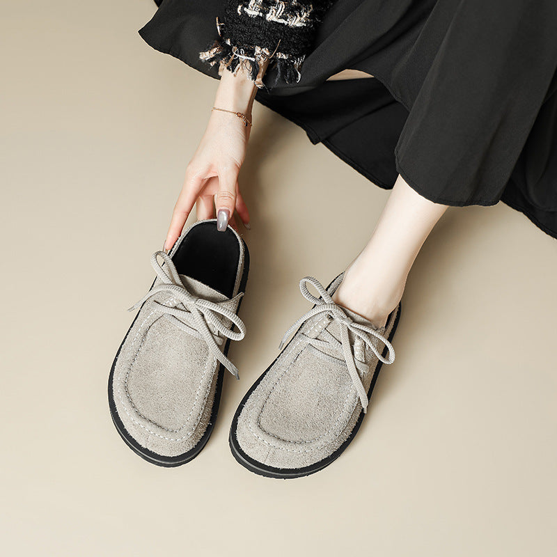 Pantoufles de boccon en cuir véritable