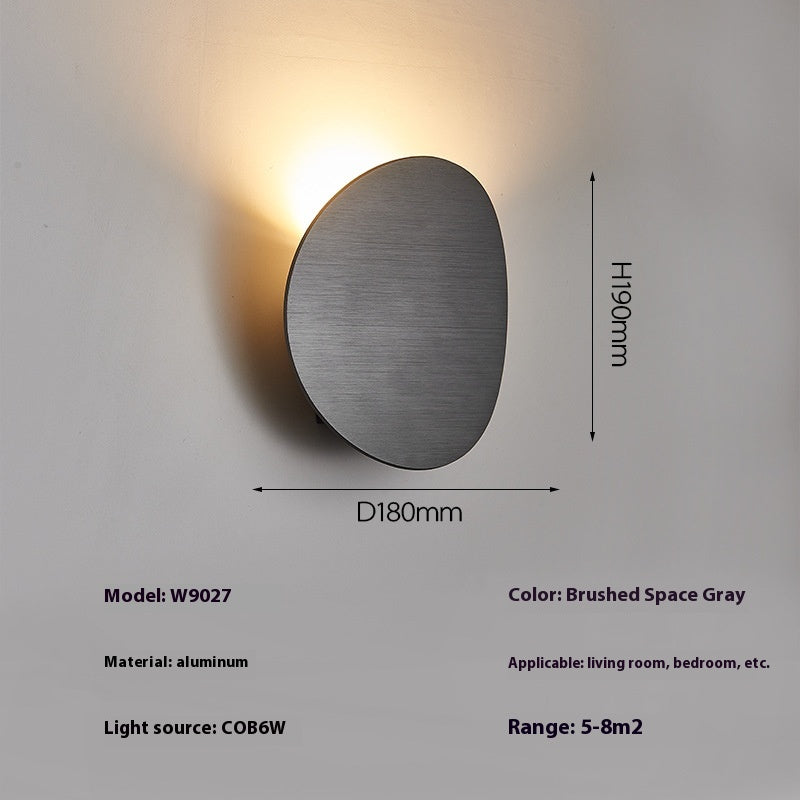 Lampe murale simple côté lit