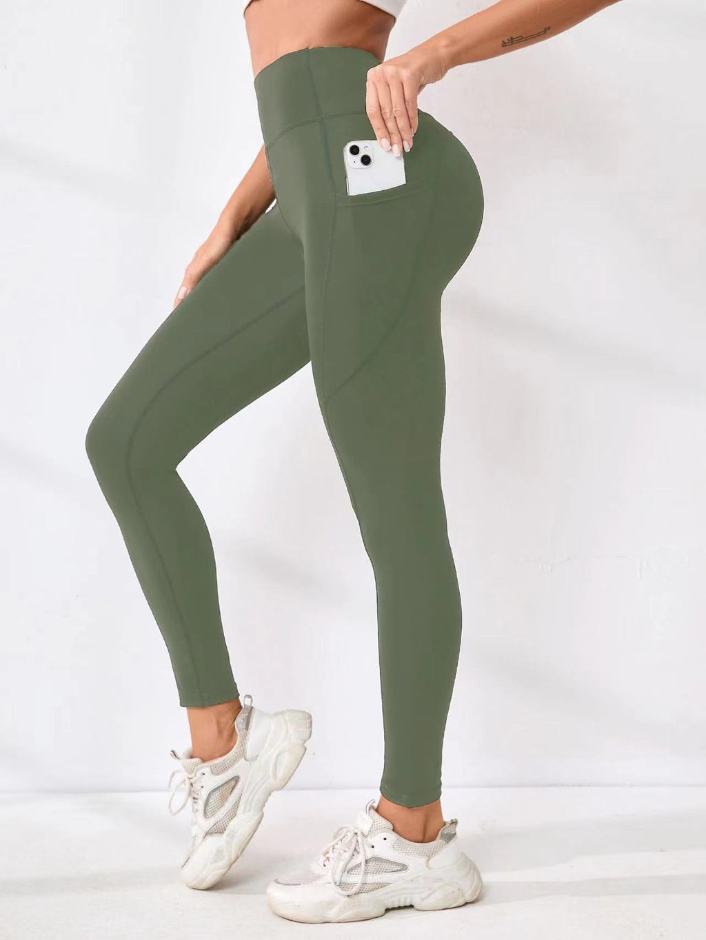 Pantalon de yoga européen et américain Couleur solide Splicing Hip-Lifting Pocket Outd