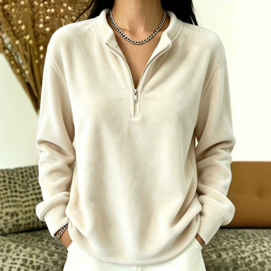 Top à manches longues de couleur unie avec un collier et une fermeture éclair