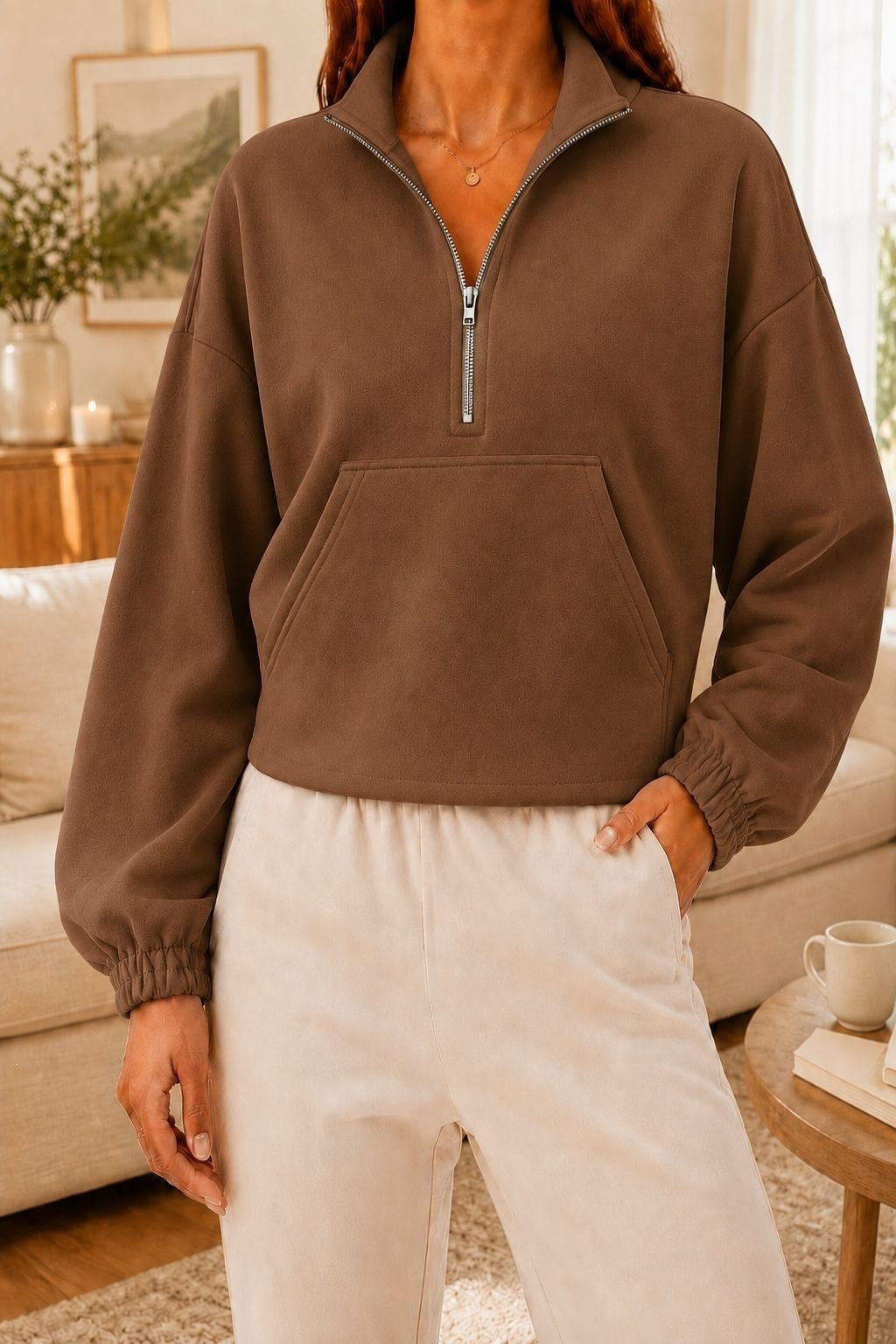 Hoodie de lapelle à half-zip avec un ajustement relaxant et des manches longues