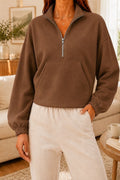 Hoodie de lapelle à half-zip avec un ajustement relaxant et des manches longues