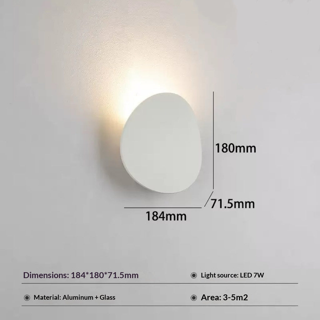 Lampe murale simple côté lit