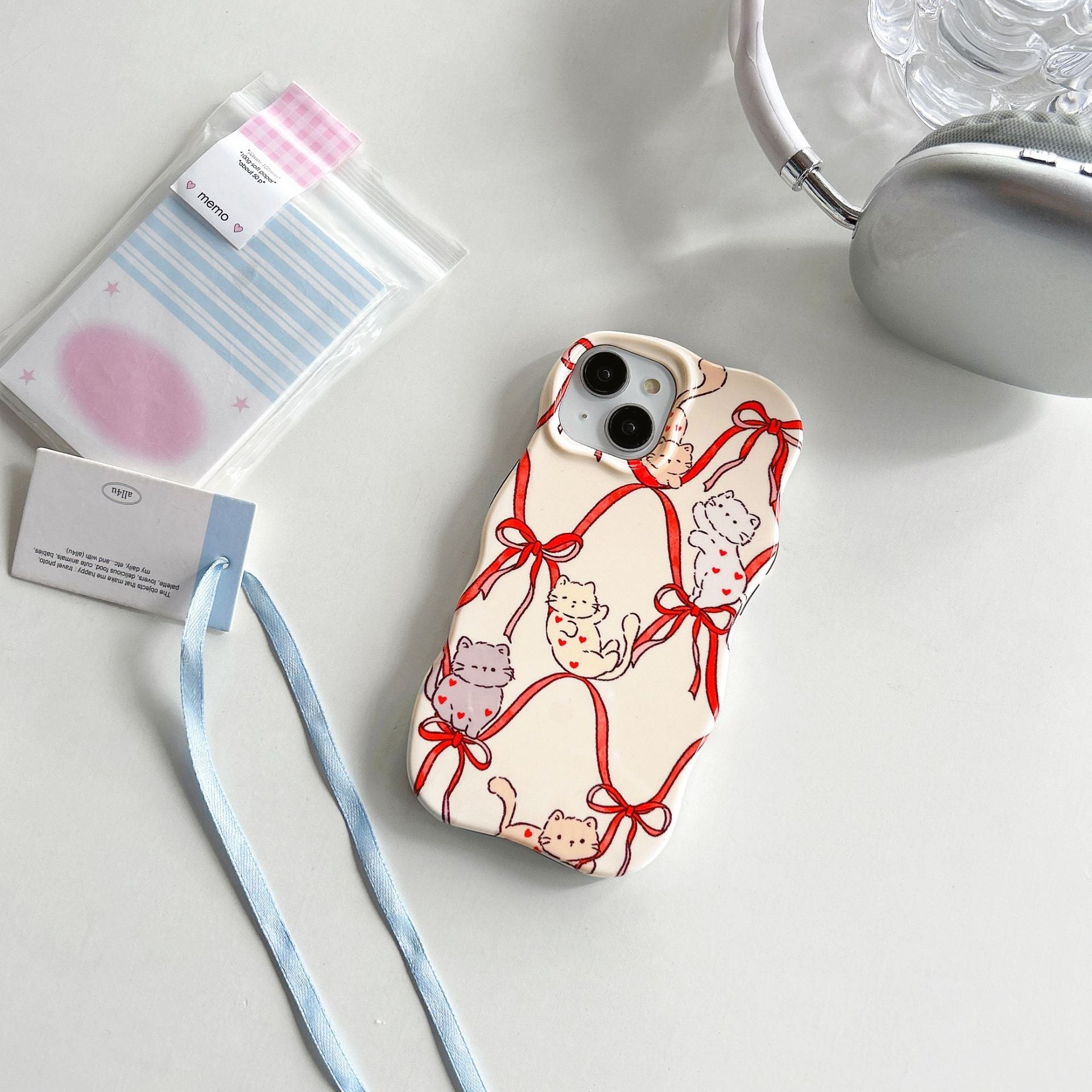Cas téléphonique de deux en un de coeur de ruban