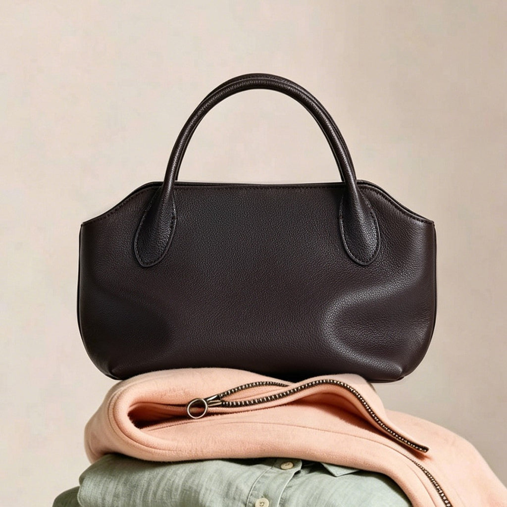 Sac à main en cuir véritable de luxe léger d'été avec une poignée courte fabriquée à partir de la vache à grains supérieurs