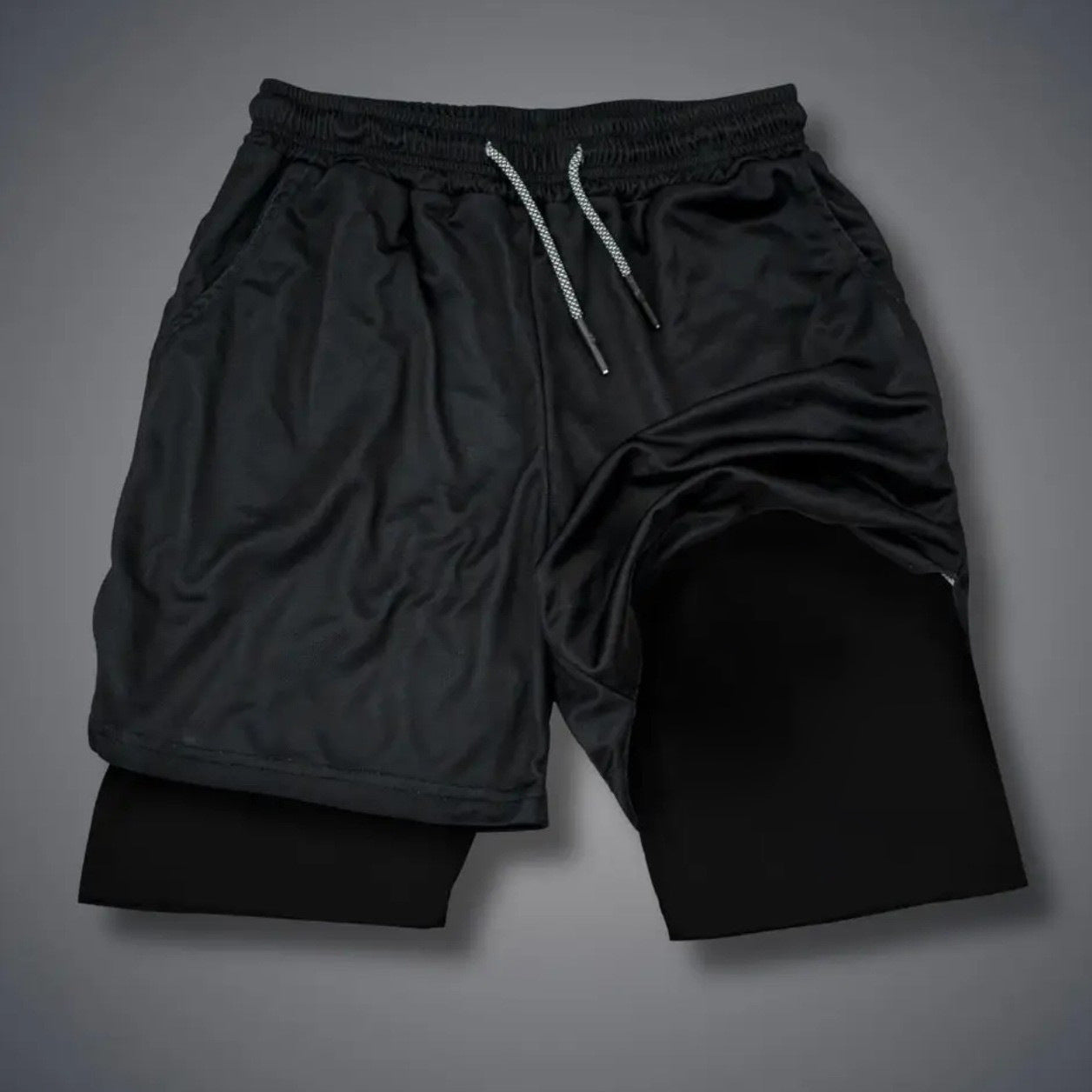 Short casual respirant double-layer homme avec un faux design à deux pièces