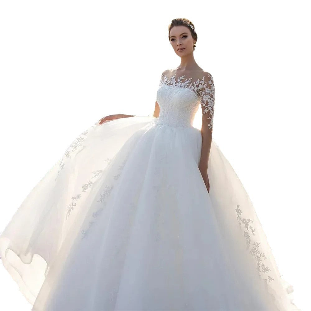 Robe de mariée brodée à manches longues en mesh