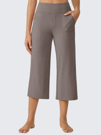 Les femmes haute taille emportent droit pantalons de yoga occasionnels avec des poches