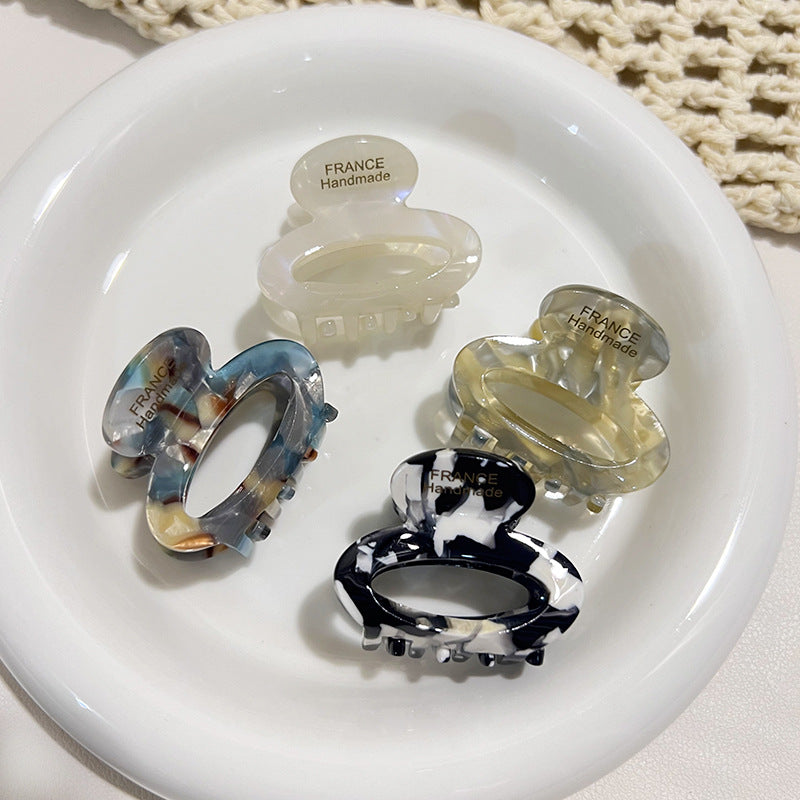 Vinaigre-acide Floral Petits cheveux Clip Forme ovale minimaliste