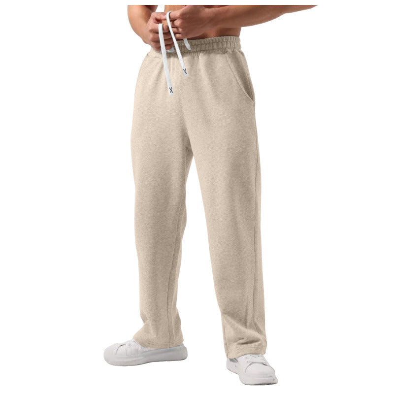 Sweatpants à cordons élastiques de couleur solide mâle