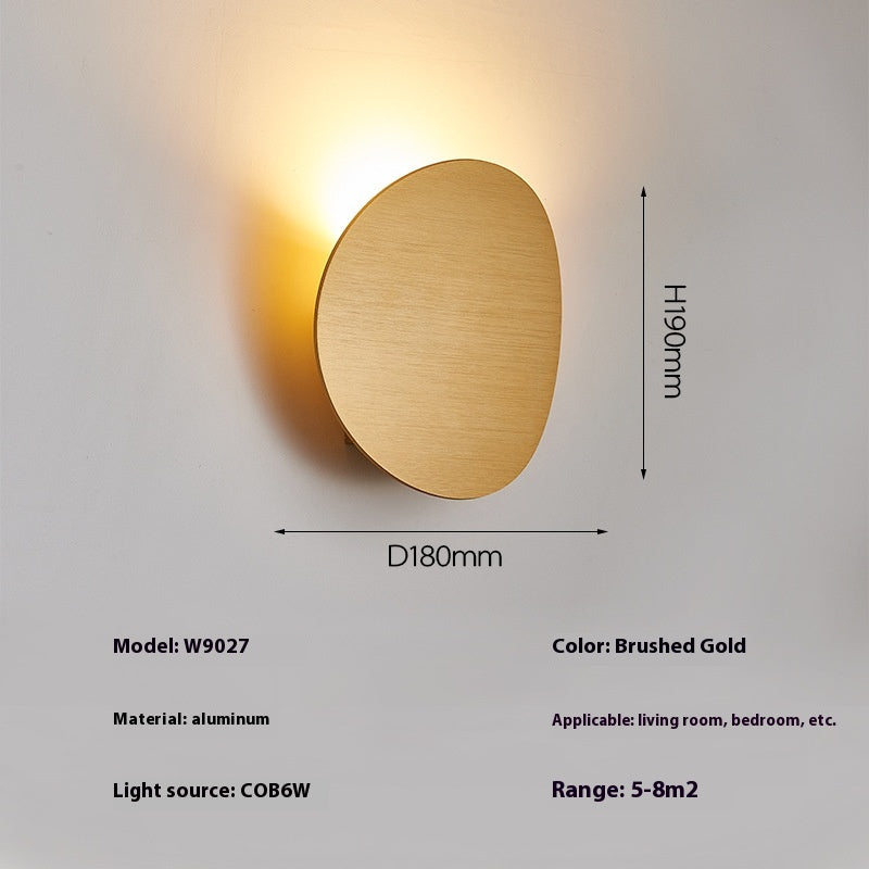 Lampe murale simple côté lit
