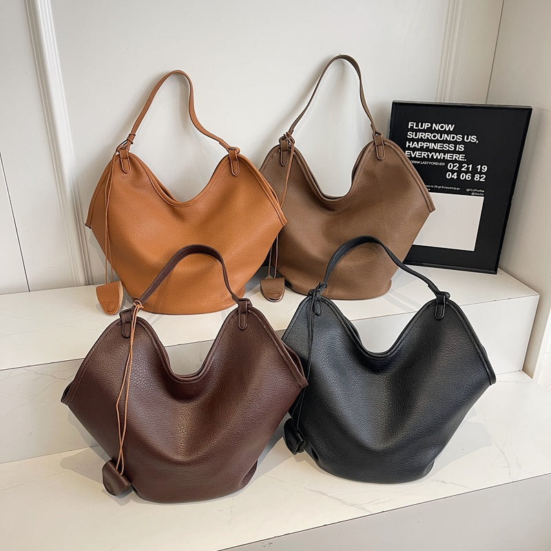 Vieux sac de seau de lit pour femmes