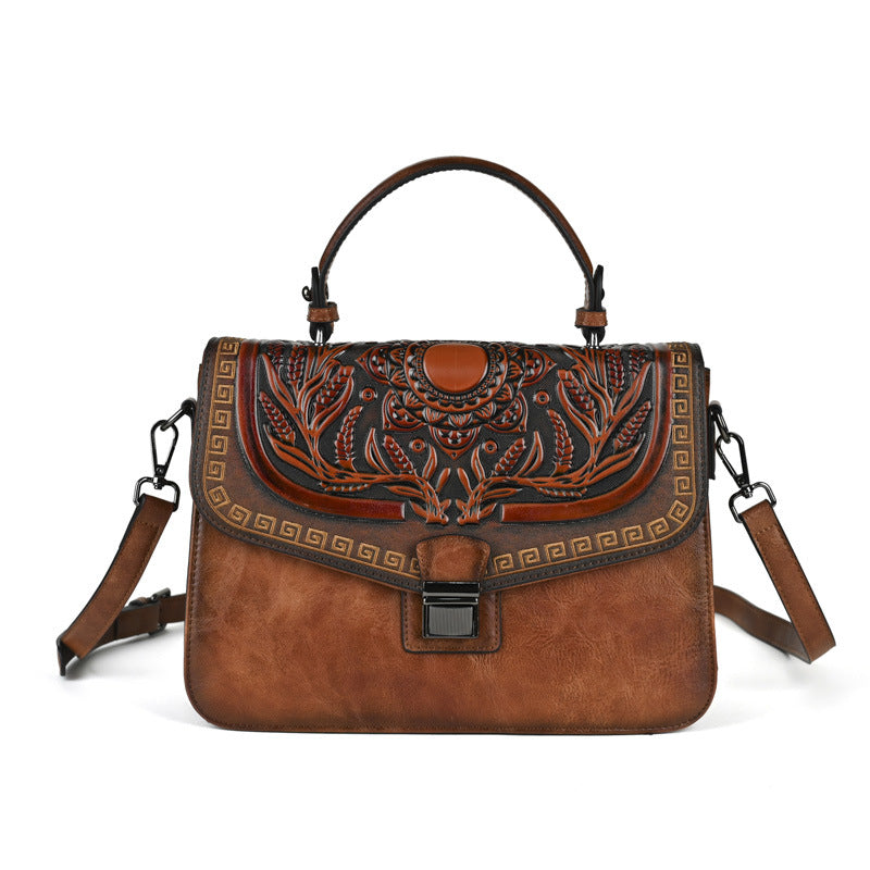 Sac à main artisanal avec une bande transversale et un design de bloc de couleur