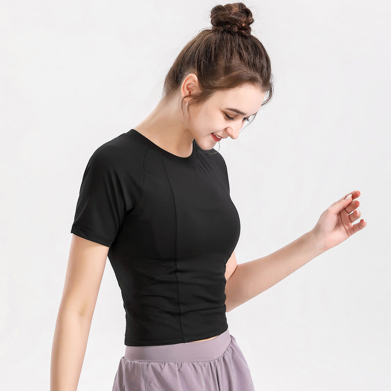 L'usure du yoga mince à manches courtes pour femmes