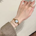 Montre en alliage élégant et minimaliste pour femmes