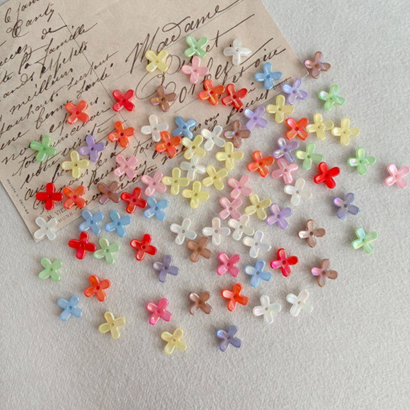 Perles de fleurs en acrylique avec paillettes dorées