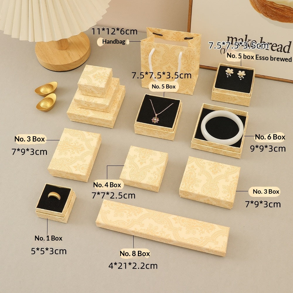 Exquise, boîte-cadeau à bijoux légère-luxe avec une ancienne esthétique haut de gamme