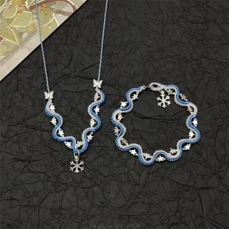 Ciel étoilé et flocons de neige s'entremêlent pour former un bracelet et un clavicule de style chinois Nec