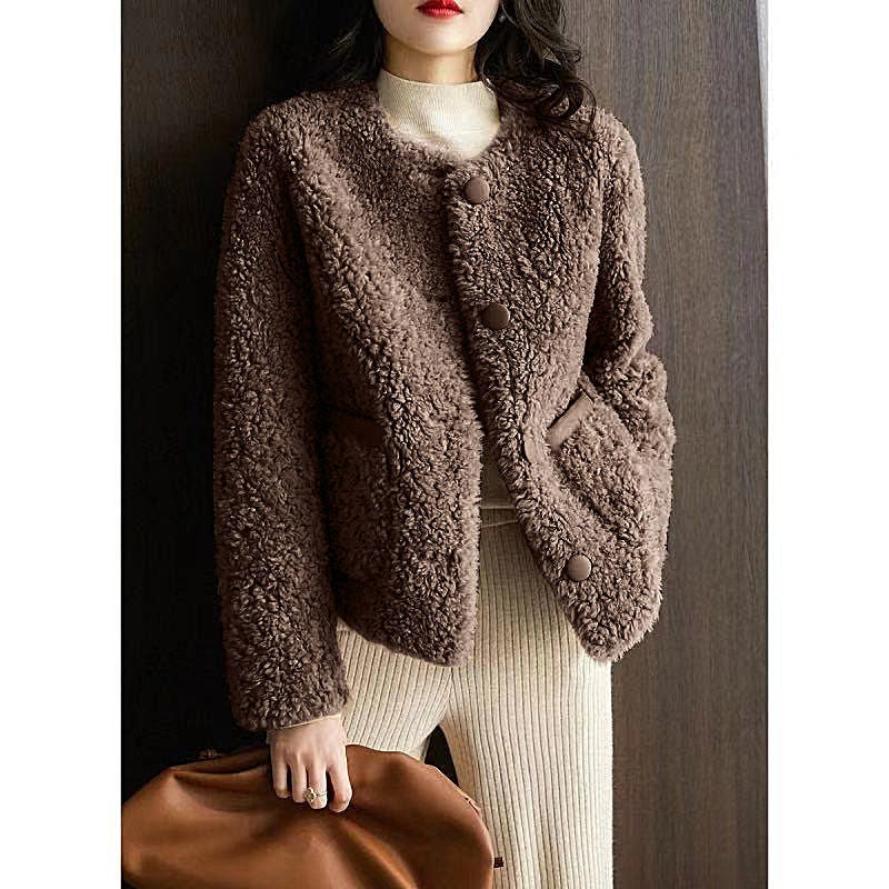 Manteau court doublé en cuir et en fourrure combiné avec du lambswool