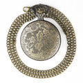 Vieille montre de poche fléchée aux gros oiseaux