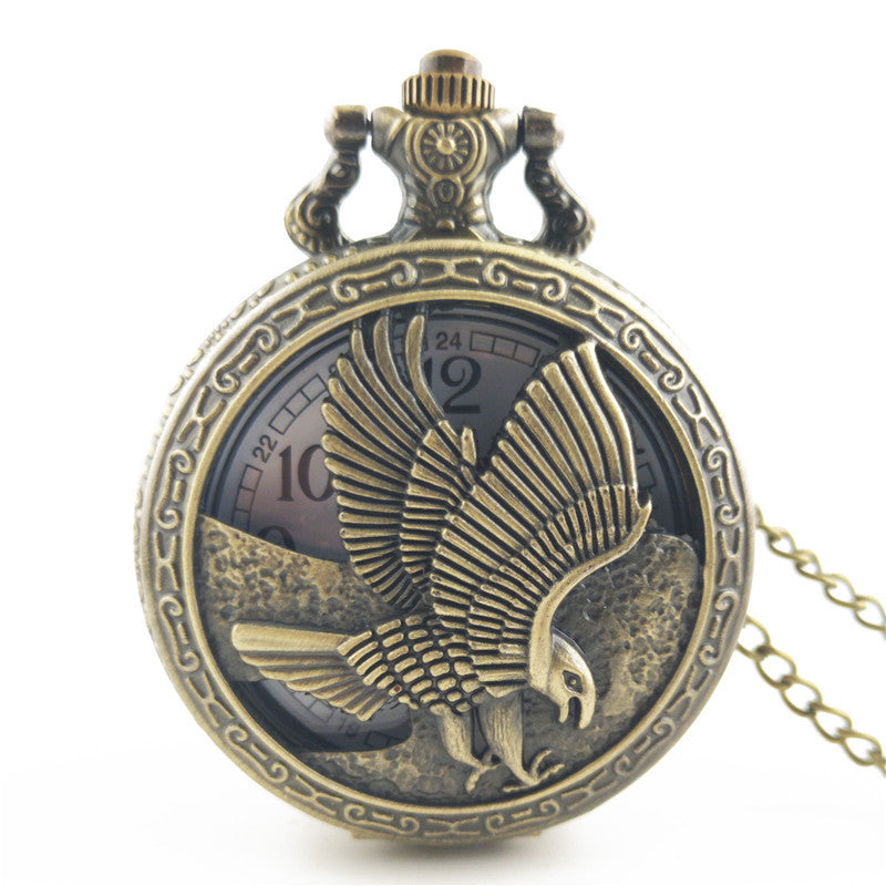 Vieille montre de poche fléchée aux gros oiseaux