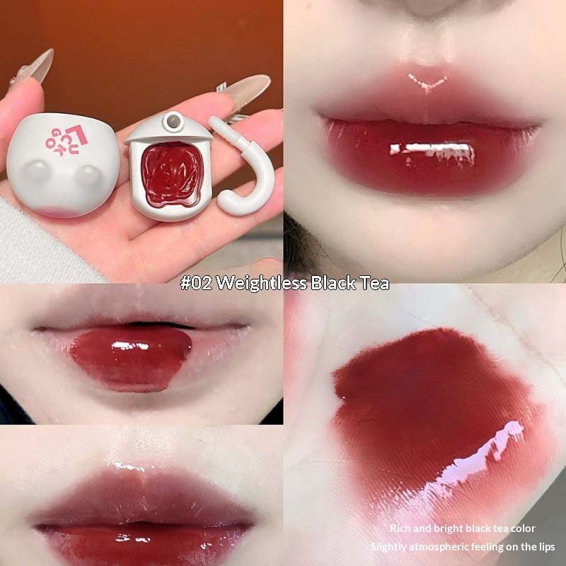 Orange Cat Lip Glaze Sheer et jeune avec une finition miroir comme Dewy