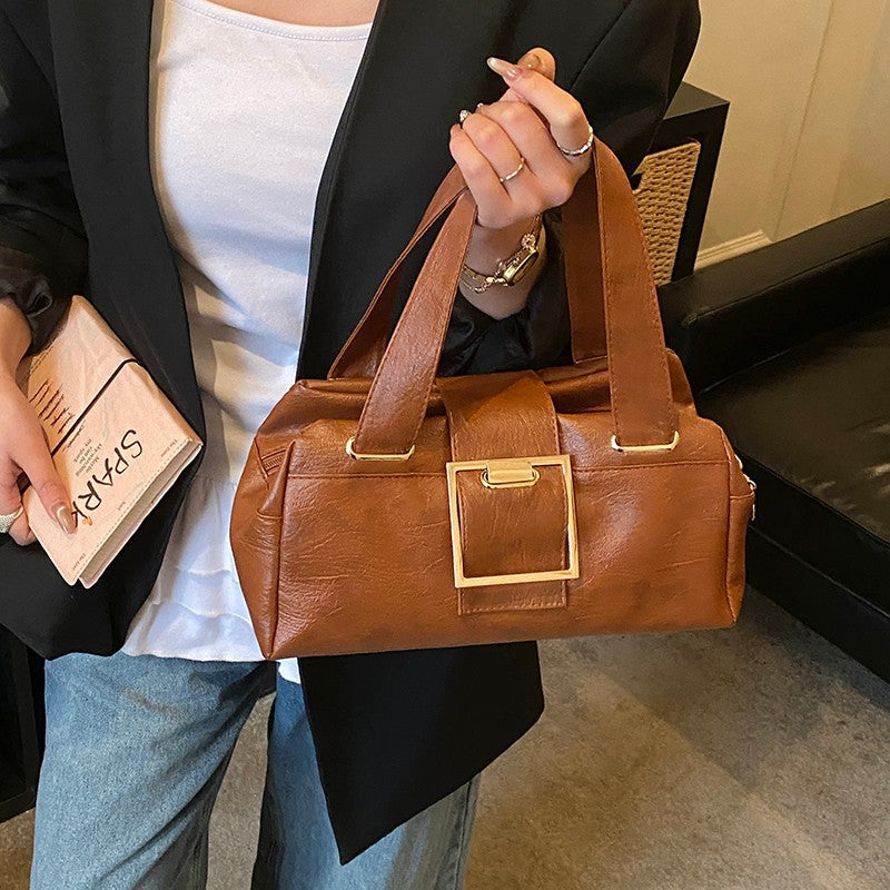 Sac à main retro en cuir souple avec un simple