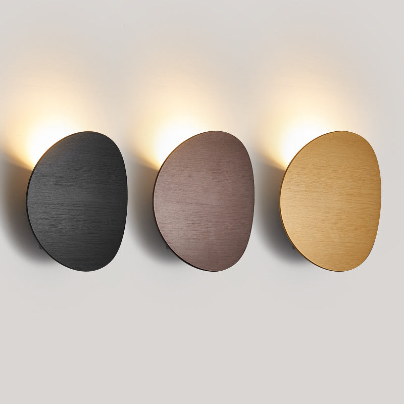 Lampe murale simple côté lit