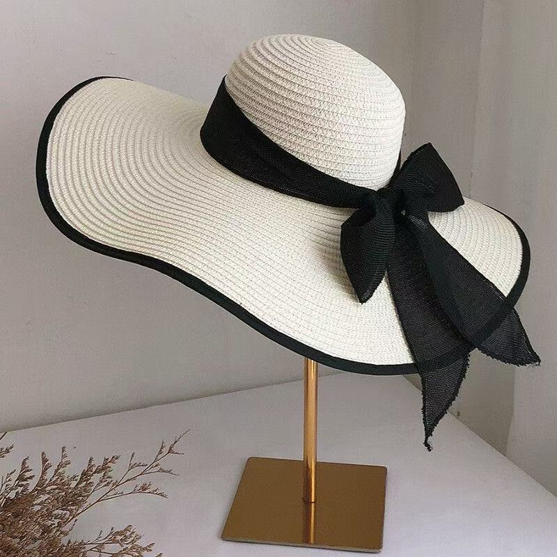 Chapeau de style français Bow Straw pour femmes Protection solaire d'été avec une large brim