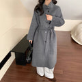 Manteau de laine longue pour femmes avec un design à un seul sein