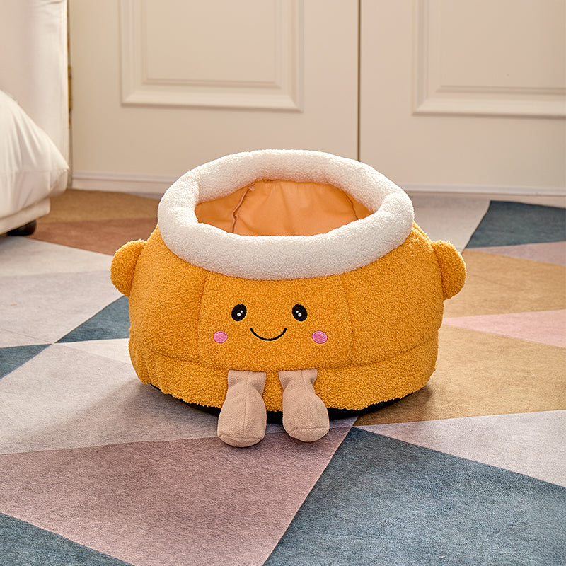 Lit de chat avec sourire orange