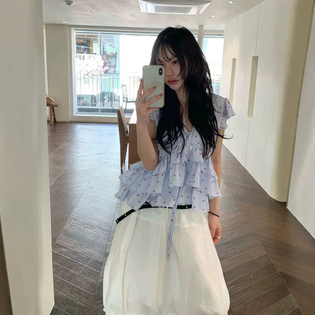 Veste de blouse plissée avec rubans