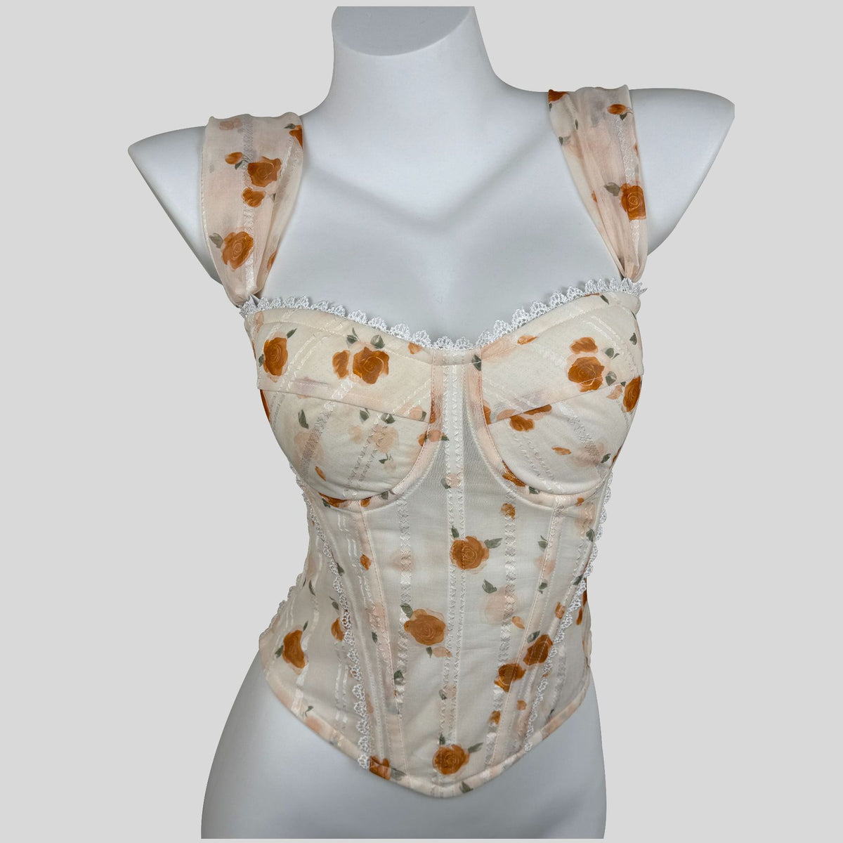 Corset encastré en dentelle à l'abricot