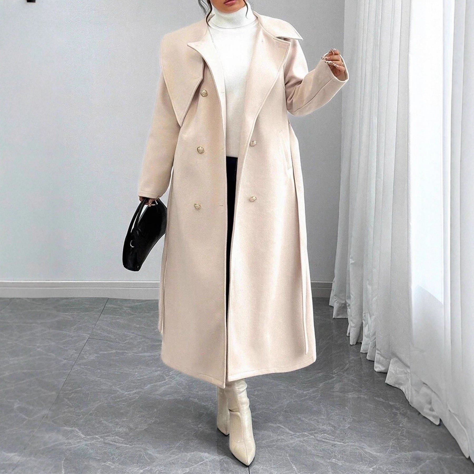 Manteau de laine à deux seins avec un collier asymétrique