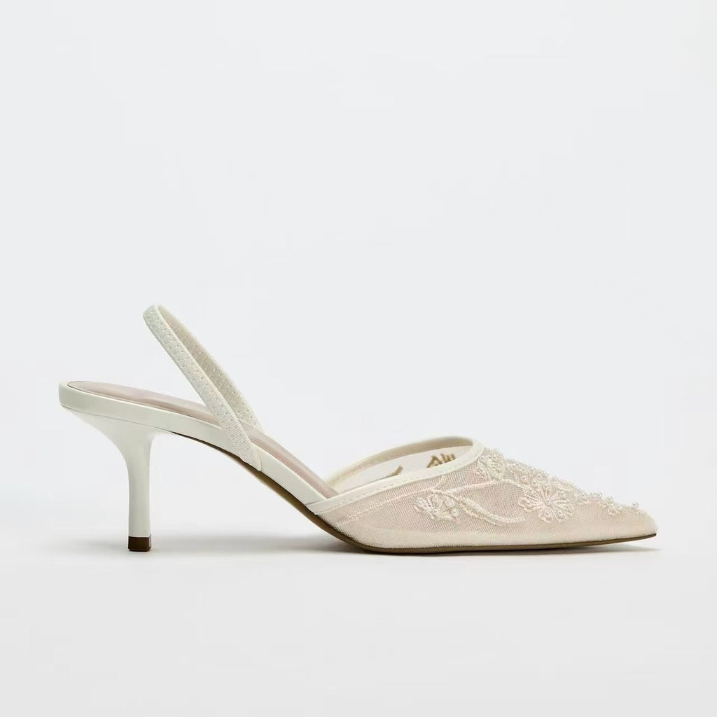 Mules de mailles brodées de couleur solide