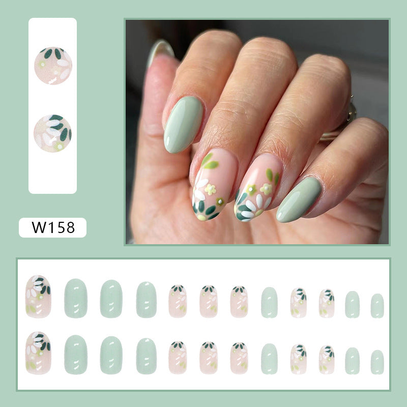 Nails à tête ronde avec de petites fleurs pour les femmes