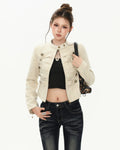 Veste en cuir court style biker vintage avec détails métalliques