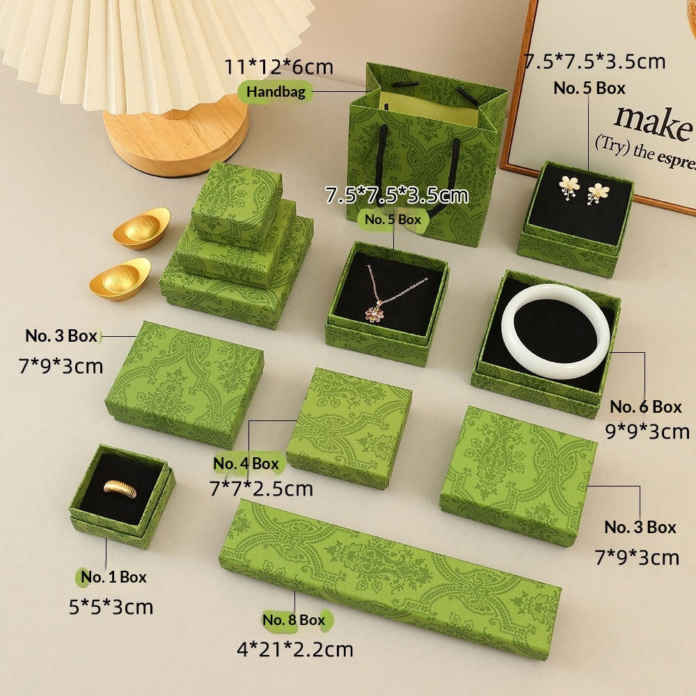 Exquise, boîte-cadeau à bijoux légère-luxe avec une ancienne esthétique haut de gamme