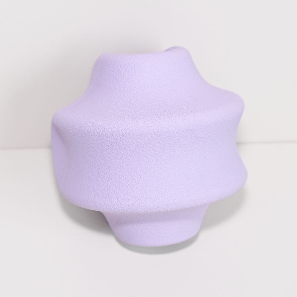 Natural rubber pet food dispensing toy