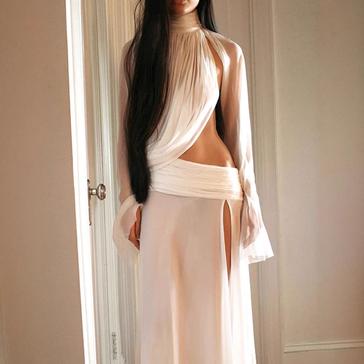Flared dress with three-dimensional pleats and stacked pants