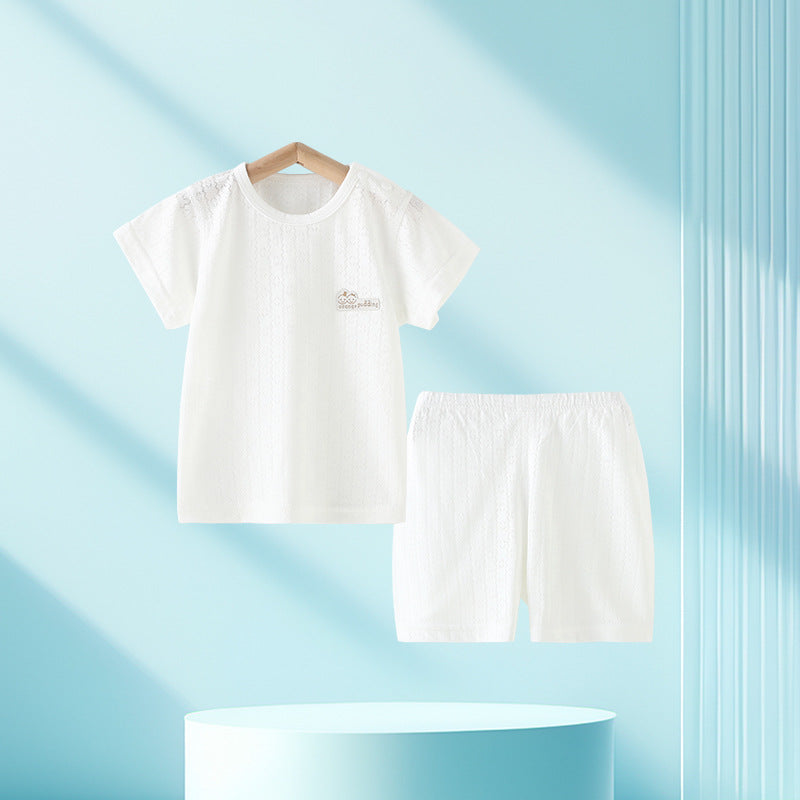 Le top et le short pour enfants deux-pièces d'été