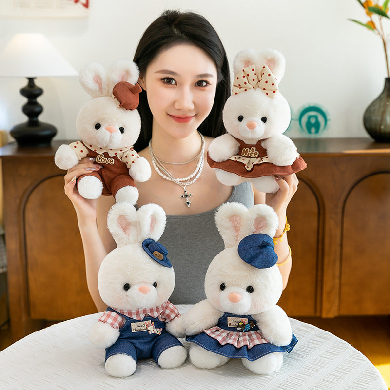 Cute plush bunny toy young couple