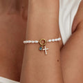 Bracelet en perles d'eau douce avec douze pierres zodiac et une croix