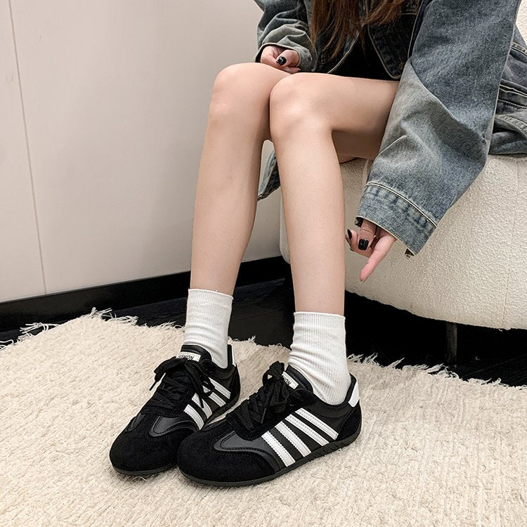 Chaussures de formation rétro en allemand noir