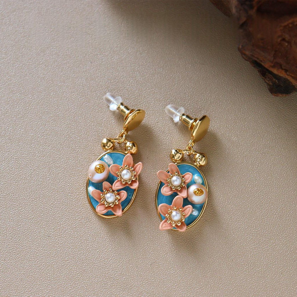 Boucles d'oreilles en trois dimensions en perles d'eau douce