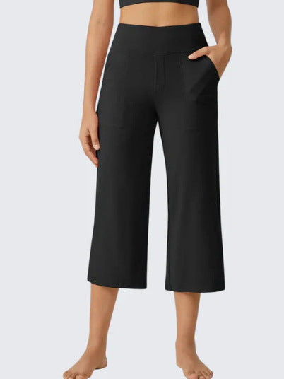 Les femmes haute taille emportent droit pantalons de yoga occasionnels avec des poches