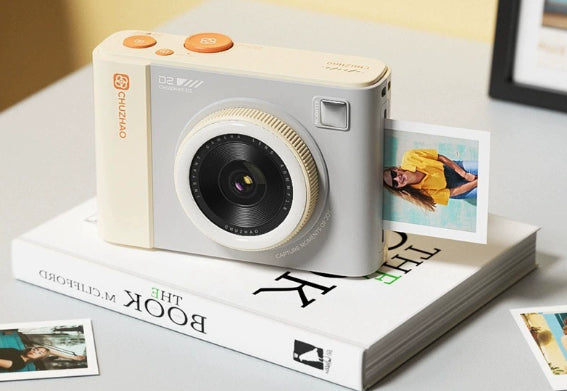 Mini caméra de film mignon qui produit instantanément des photos couleur