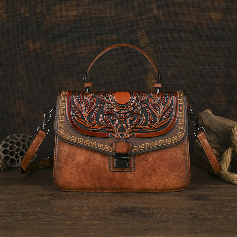 Sac à main artisanal avec une bande transversale et un design de bloc de couleur
